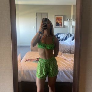 Frankie’s Bikinis green, floral top